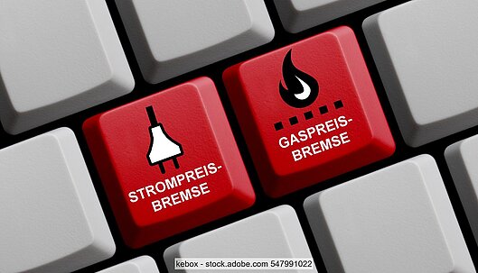 Tastatur mit zwei rot gefärbten Tasten mit Aufrduck "Strompreisbremse" und "Gaspreisbremse"