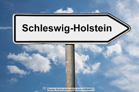 Schild mit Aufschrift Schleswig-Holstein